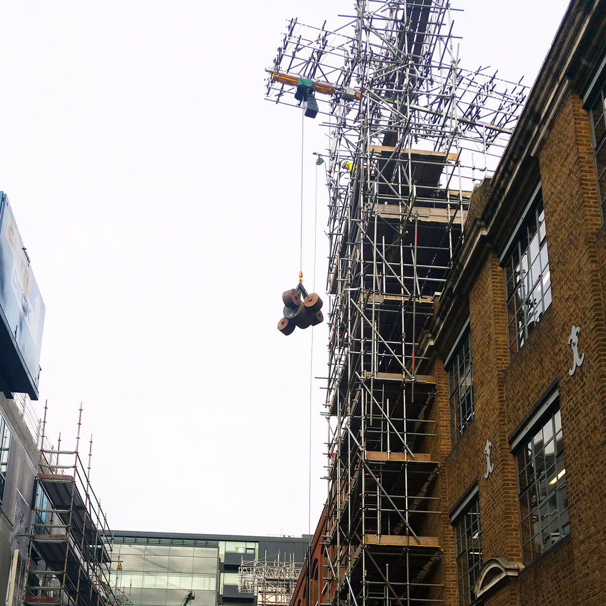 Scaffold hoist and beam structure News